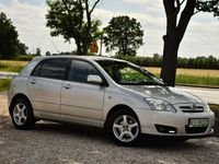 Używany Toyota Corolla 90 KM (66 kW) 2006 Beżowy (metalik, perła) Hatchback