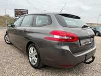 Używany Peugeot 308 SW 130 KM (95 kW) 2016 Szary Kombi