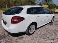 Używany Renault Laguna III 110 KM (80 kW) 2013 Biały Kombi