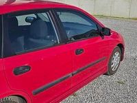 Używany Honda Civic 90 KM (66 kW) 2004 Czerwony Hatchback