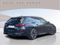 Używany BMW 520 Comfort Edition 197 KM (144 kW) 2024 Czarny carbon m metalizowany Kombi