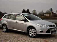 Używany Ford Focus 105 KM (77 kW) 2011 Srebrny (metalik, perła) Kombi