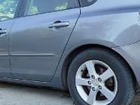 Używany Mazda 3 105 KM (77 kW) 2004 Szary Hatchback