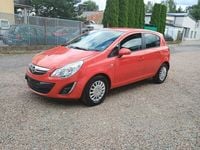 Używany Opel Corsa 70 KM (51 kW) 2011 Czerwony Sedan/Limuzyna
