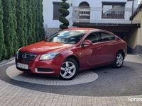 Używany Opel Insignia 130 KM (95 kW) 2009 Bordowy (metalik) Sedan/Limuzyna