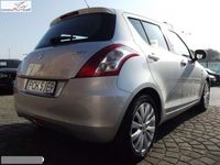 Używany Suzuki Swift GLX 75 KM (55 kW) 2011 Srebrny (metalik) Hatchback