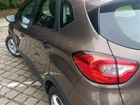 Używany Renault Captur 90 KM (66 kW) 2013 Brązowobeżowy SUV