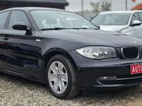 Używany BMW 116 122 KM (89 kW) 2009 Czarny (metalik) Hatchback