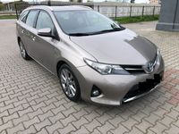 Używany Toyota Auris Hybrid 136 KM (100 kW) 2015 Szary Sedan/Limuzyna