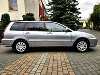 Używany Mitsubishi Lancer 98 KM (72 kW) 2006 Srebrny (metalik) Kombi