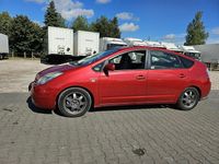 Używany Toyota Prius 77 KM (56 kW) 2007 Czerwony (metalik) Hatchback