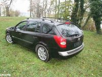 Używany Renault Laguna II 135 KM (99 kW) 2005 Czarny (metalik, perła) Sedan/Limuzyna