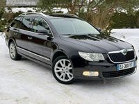 Używany Skoda Superb 170 KM (125 kW) 2011 Czarny (metalik) Kombi
