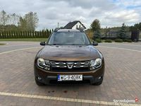 Używany Dacia Duster 125 KM (91 kW) 2015 Brązowobeżowy SUV