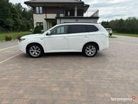 Używany Mitsubishi Outlander P-HEV 121 KM (88 kW) 2014 Biały (metalik, perła) SUV