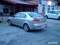 Używany Mitsubishi Lancer 109 KM (80 kW) 2010 Zielony Sedan/Limuzyna