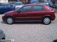 Używany Opel Astra 90 KM (66 kW) 2000 Czerwony (metalik) Hatchback