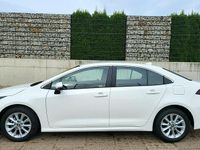 Używany Toyota Corolla Comfort 125 KM (91 kW) 2022 Brązowy Sedan/Limuzyna