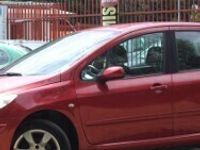 Używany Peugeot 307 109 KM (80 kW) 2007 Bordowy Hatchback