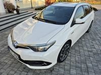 Używany Toyota Auris Hybrid 98 KM (72 kW) 2018 Biały Hatchback