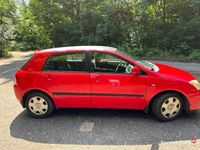 Używany Toyota Corolla 98 KM (72 kW) 2003 Czerwony Hatchback