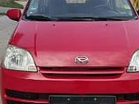 Używany Daihatsu Cuore 58 KM (42 kW) 2006 Czerwony Hatchback
