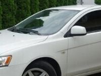 używany Mitsubishi Lancer 1.6dm 116KM 2011r. 157 000km