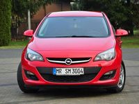 Używany Opel Astra 115 KM (84 kW) 2015 Czerwony (metalik) Sedan/Limuzyna