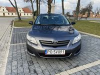Używany Toyota Corolla 124 KM (91 kW) 2007 Szary Sedan/Limuzyna