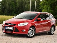 Używany Ford Focus 125 KM (91 kW) 2013 Bordowy (metalik, perła) Kombi