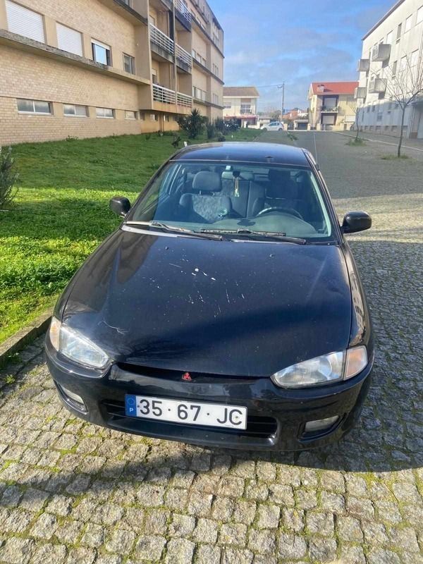 Preto Usado 1997 Mitsubishi Colt Citadino | € 900 - Imagem 1/4