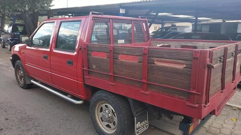 Usado Opel Campo 76 HP (55 kW) 1999 Vermelho Pickup