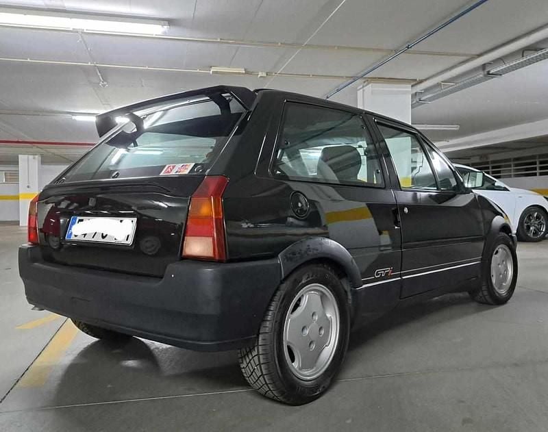 Usado Citroën AX 100 HP (73 kW) 1992 Preto Citadino