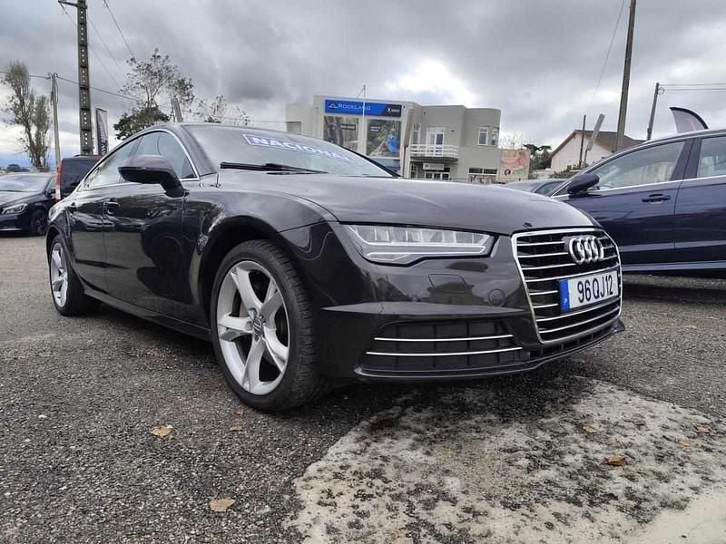Antracite Usado 2015 Audi A7 Citadino | € 29.900 - Imagem 1/4