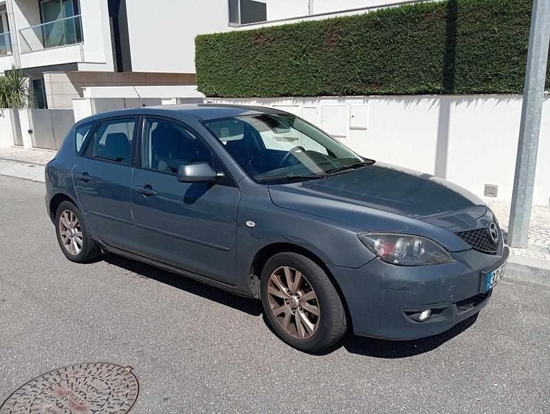 Cinzento Usado 2007 Mazda 3 Citadino | € 3.400 (Preço justo) - Imagem 1/4