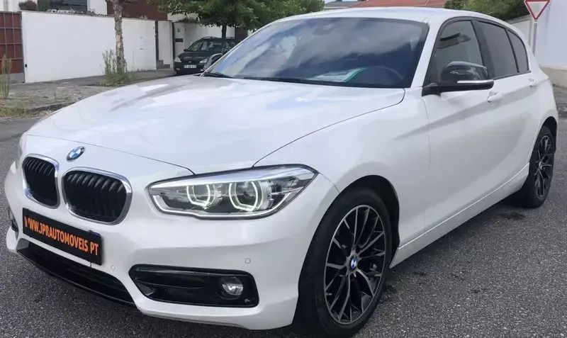 Branco pérola Usado 2018 BMW 116 Sport Line Citadino | € 16.990 (Preço justo) - Imagem 1/4
