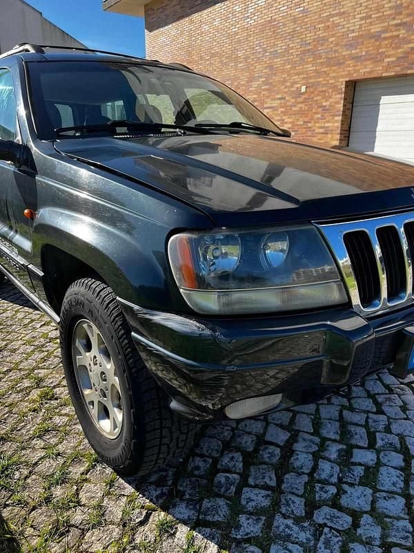 Usado Jeep Grand Cherokee Laredo 140 HP (102 kW) 1999 Cinzento SUV