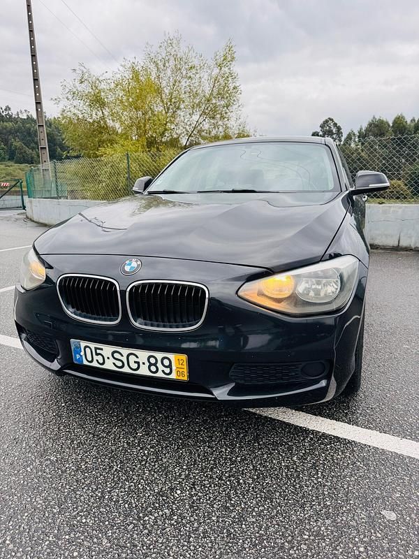 Preto Usado 2012 BMW 116 Efficient Dynamics Citadino | € 9.970 - Imagem 1/4