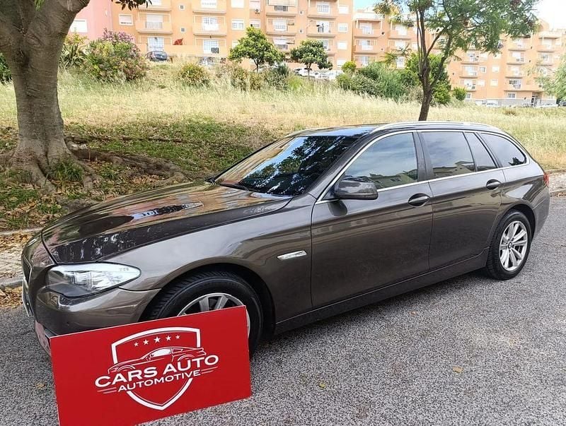 Castanho Usado 2012 BMW 520 Carrinha | € 14.999 (Preço justo) - Imagem 1/4