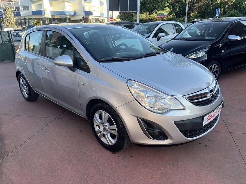 Usado Opel Corsa 85 HP (62 kW) 2011 Cinzento Citadino