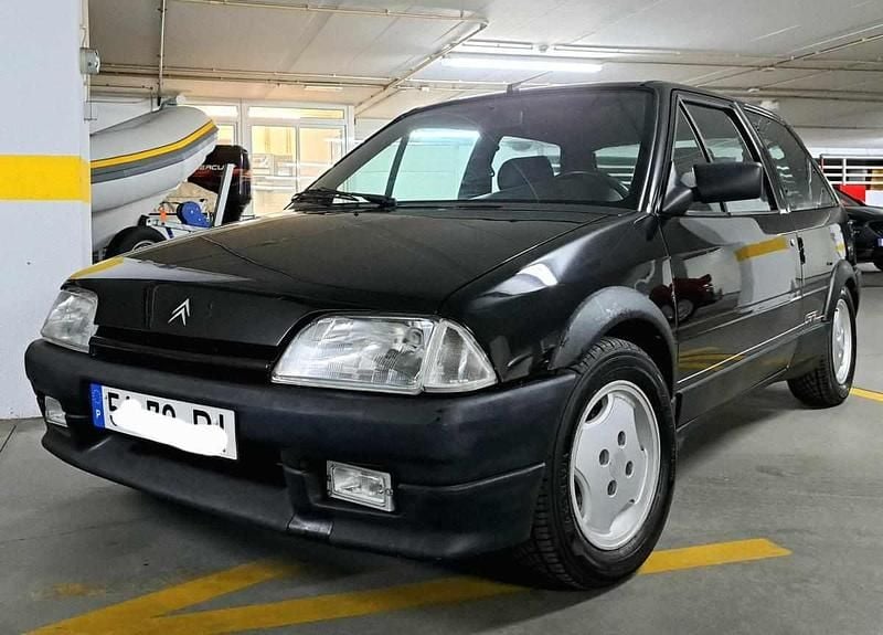 Usado Citroën AX 100 HP (73 kW) 1992 Preto Citadino