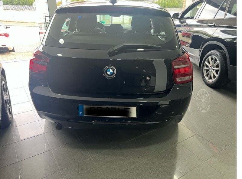 Preto Usado 2013 BMW 116 Efficient Dynamics Citadino | € 12.500 - Imagem 1/4