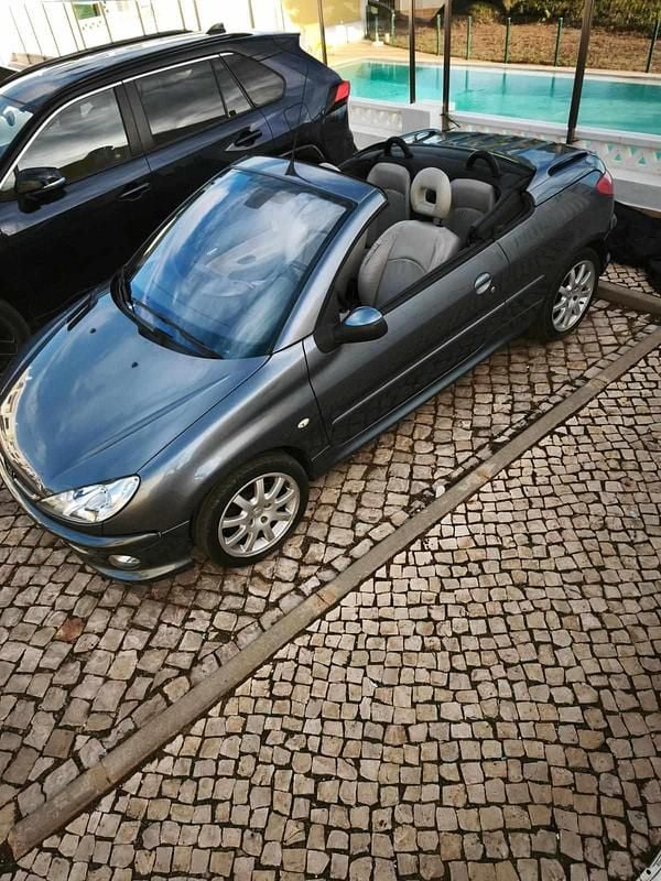 Usado Peugeot 206 109 HP (80 kW) 2006 Cinzento Cabrios