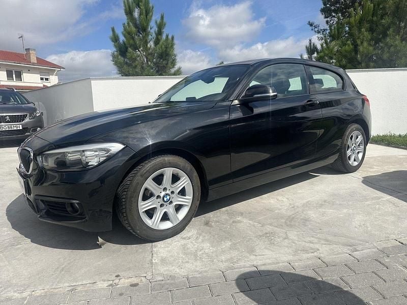 Preto Usado 2017 BMW 118 Urban Line Citadino | € 19.500 (Preço justo) - Imagem 1/4
