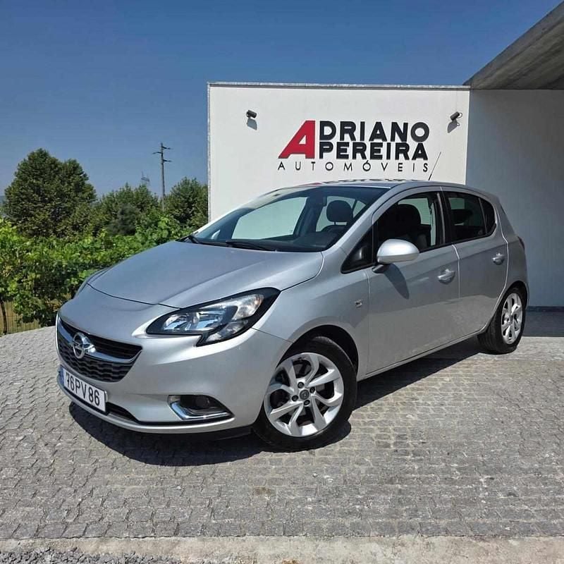 Cinza Usado 2015 Opel Corsa Color Edition Citadino | € 9.990 (Preço justo) - Imagem 1/4