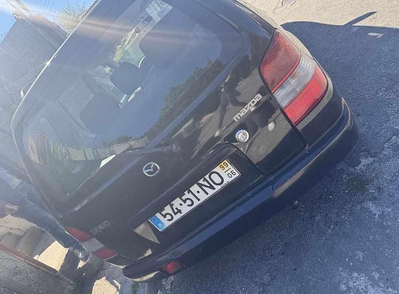 Usado Mazda Demio 72 HP (52 kW) 1999 Preto Citadino