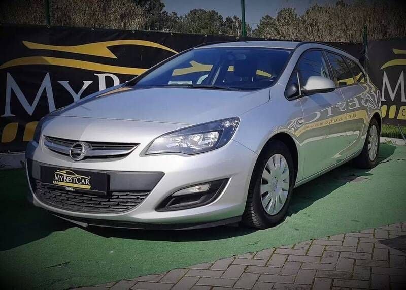 Cinzento Usado 2013 Opel Astra Enjoy Carrinha | € 8.900 (Preço justo) - Imagem 1/4
