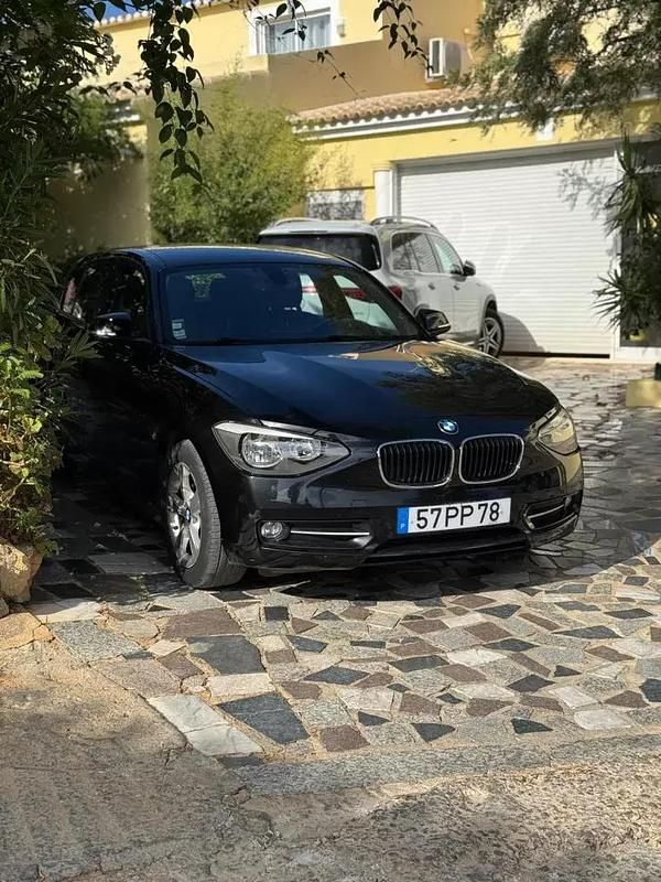 Preto Usado 2015 BMW 116 Citadino | € 15.900 (Caro) - Imagem 1/4