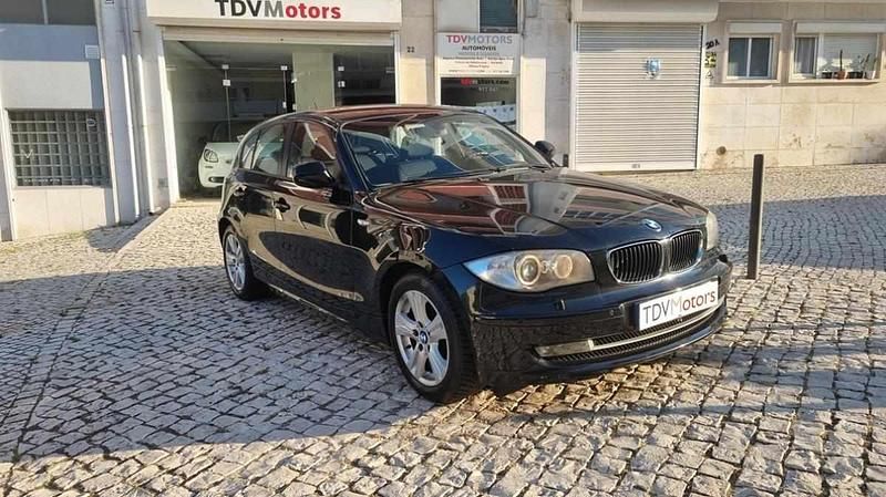 Preto Usado 2011 BMW 118 Citadino | € 11.900 - Imagem 1/4