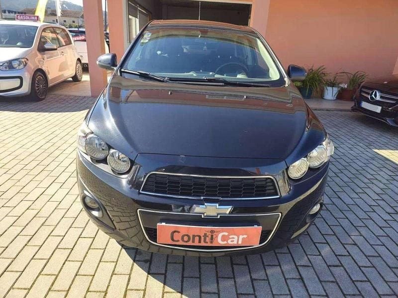 Usado Chevrolet Aveo LT 95 HP (69 kW) 2013 Preto Citadino